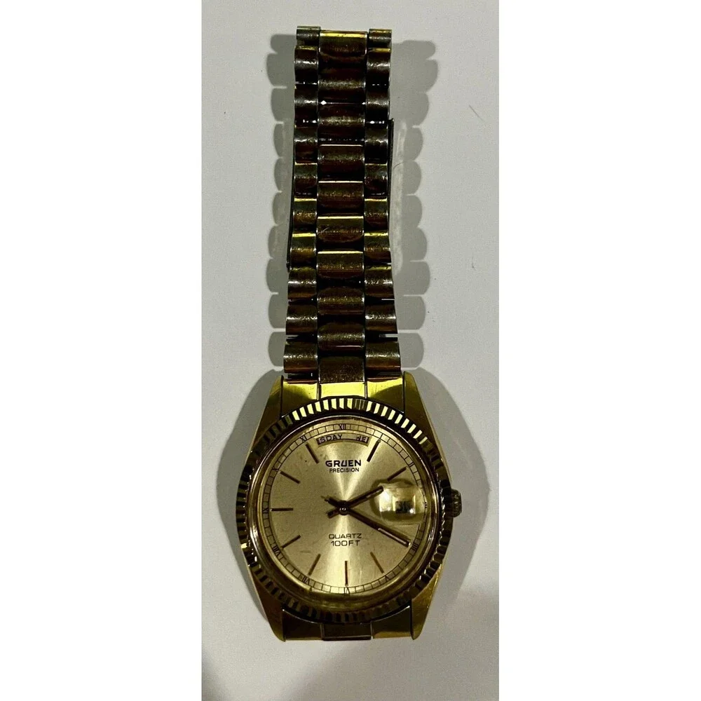 Gruen Watch Gold Dial Gold Tone Bracelet Quartz Day Date 100FT Needs Battery